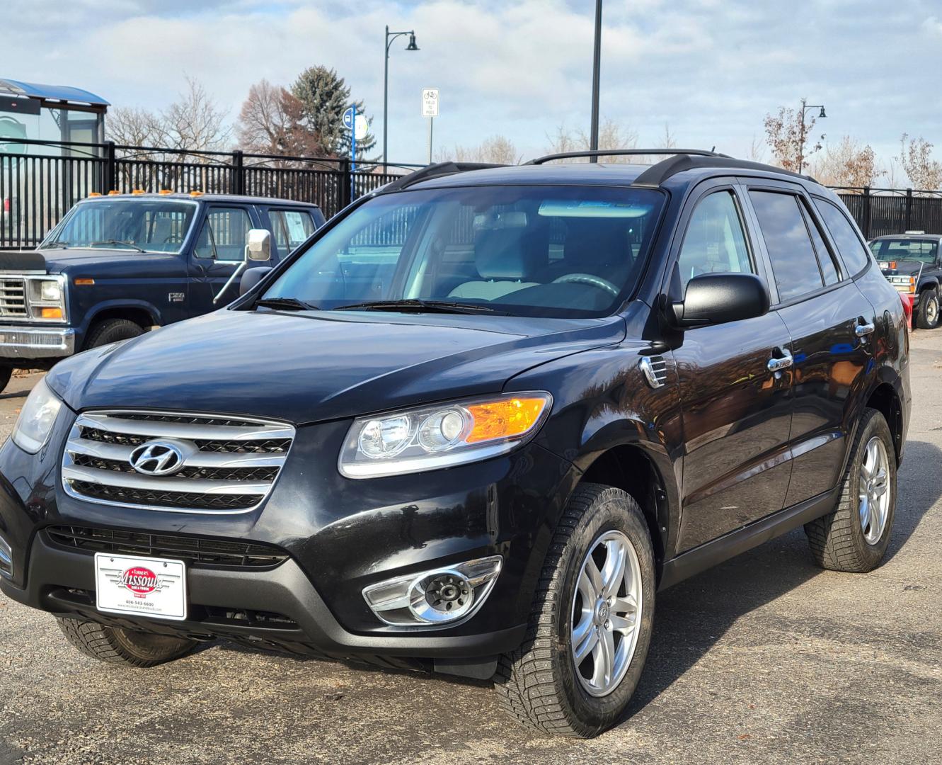 2012 Black /Tan Hyundai Santa Fe Premium (5XYZGDAB1CG) with an 2.4L I4 engine, 8 Speed Automatic transmission, located at 450 N Russell, Missoula, MT, 59801, (406) 543-6600, 46.874496, -114.017433 - Photo#8